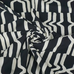  Coupon 962 Viscose in zwart met wit geometrisch patroon 180 x 140 cm
