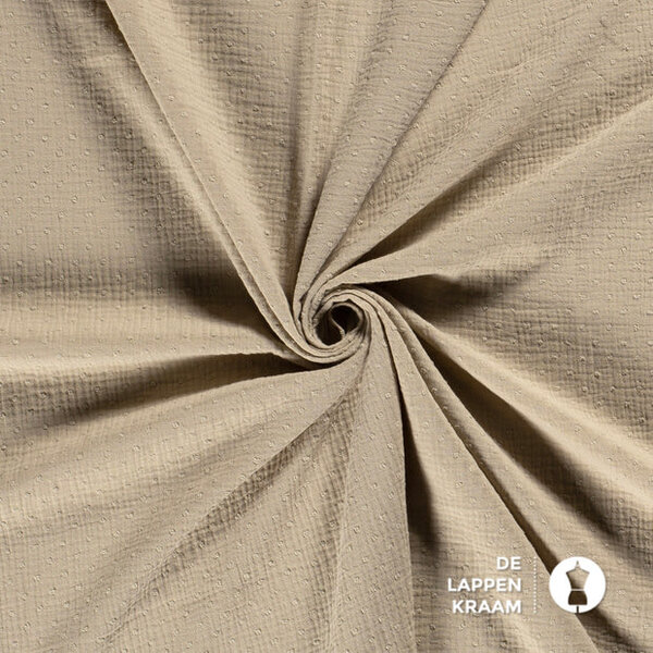 Mousseline stof met nopje beige