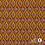 Viscose crepe stof met retroprint en lurex okergeel