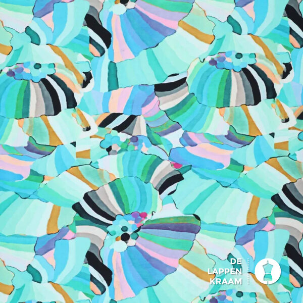 *** Katoenen tricot stof met fantasiepatroon in blauwtinten