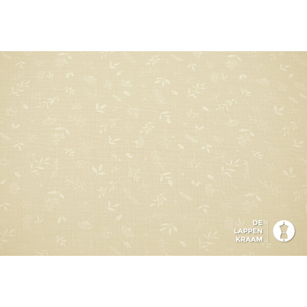 Mousseline stof met print van witte blaadjes in beige