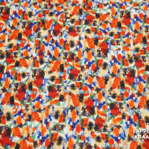 Coupon 107 Viscose stretch met oranje verfvlekjes 170 x 150 cm