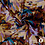 Viscose met gestyleerde bloemenprint in rood en bruintinten