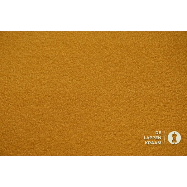 Boucle stof okergeel