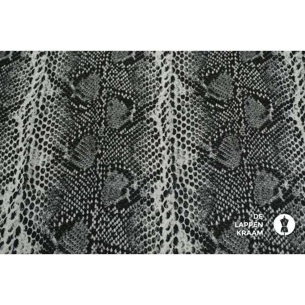 Tricot stof in grijs slangenprint met lurex