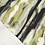 Viscose tricot met diagonaal vlekkenpatroon in groen met zwart