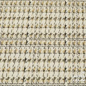  Gebreide stof met ingebreid motiefje in beigetinten