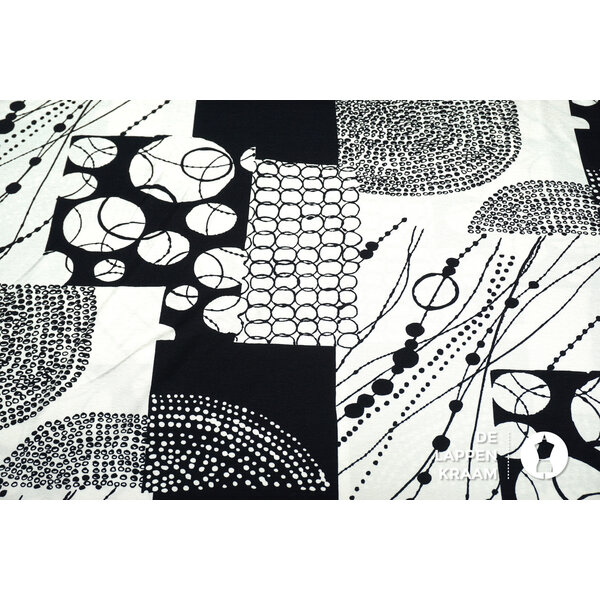 Tricot stof met abstracte print in zwart wit