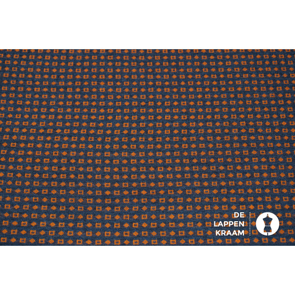 Gebreid stof donkerblauw met oranje tekentjes