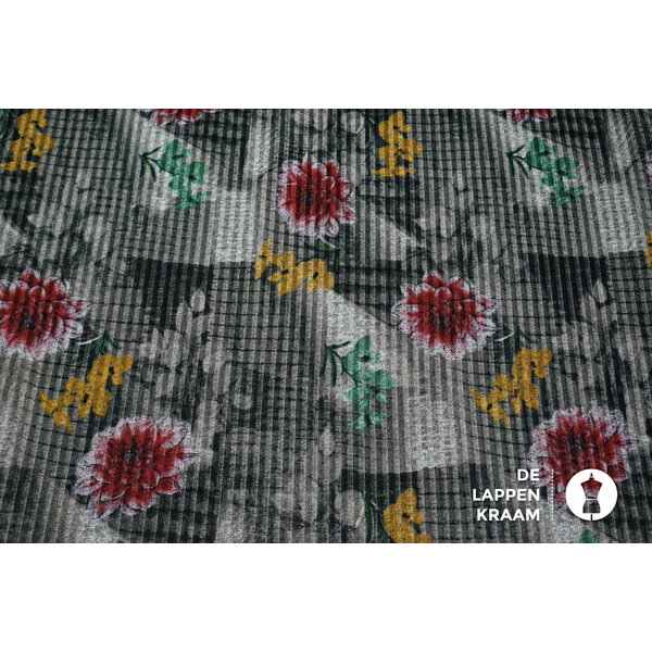 Gebreid stof met ribbel grijs met bloemen