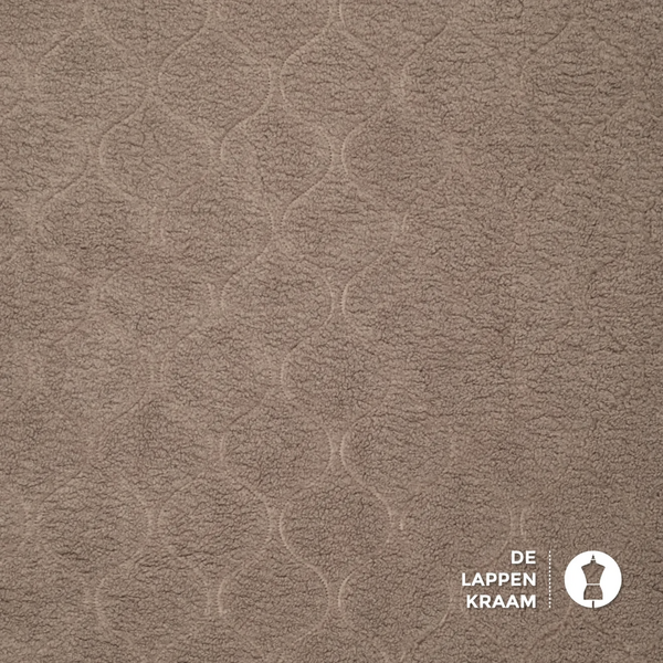 Teddy stof met ingebreid rond patroon