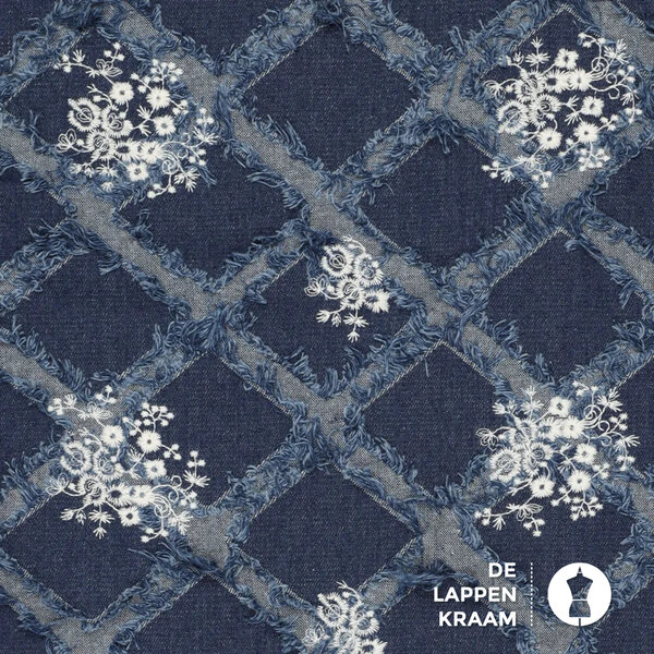 Denim stof met franjes en wit borduursel