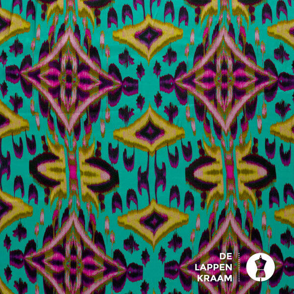 Viscose satijn stof met tribal dessin zeegroene ondergrond