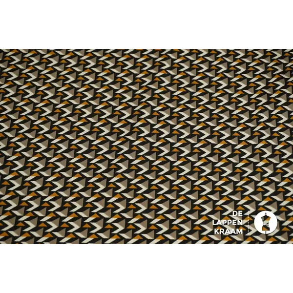 Coupon 350 Travelstof met dessin van driehoekjes in zwart, ecru en bruintinten 180 x 140 cm