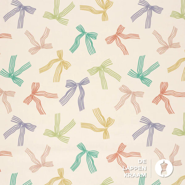 Popeline stof gebroken wit met strikjes