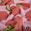 Tricot stof in roze met print van aardbeien