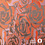 Jacquard stof met bloemdessin in tinten oranje en bruin