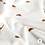 Tricot stof off white met croissantjes