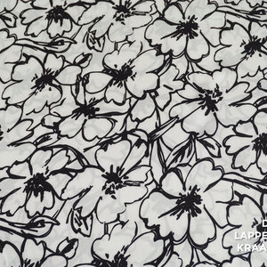  Viscose satijn wit met zwarte bloemen