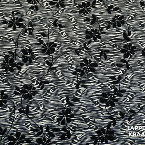  Viscose tricot zwart wit met velvet bloemenprint