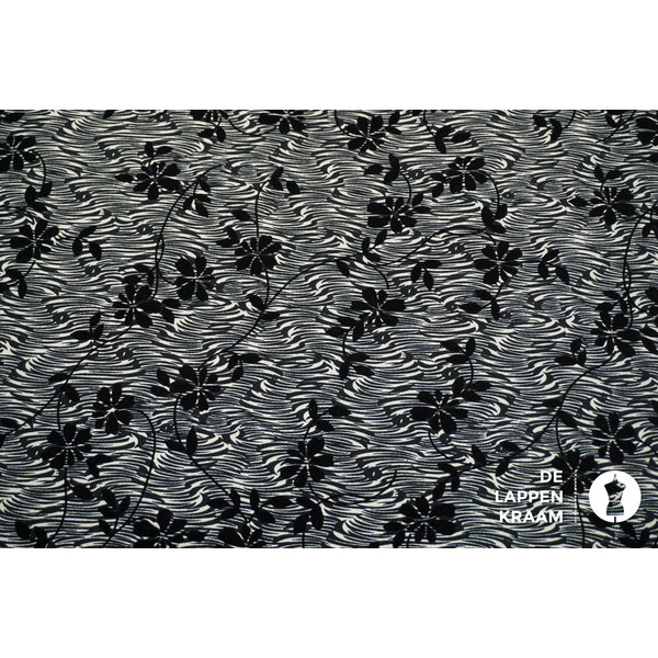 Viscose tricot stof zwart wit met velvet bloemenprint