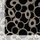 Punta di Roma stof met abstracte cirkels in beige en zwart