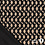 Punta stof beige met zwart/zilveren golfjes