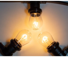 Amlux Zwarte prikkabel 10 meter met 10 warm  witte gebogen filament LED kogellampen