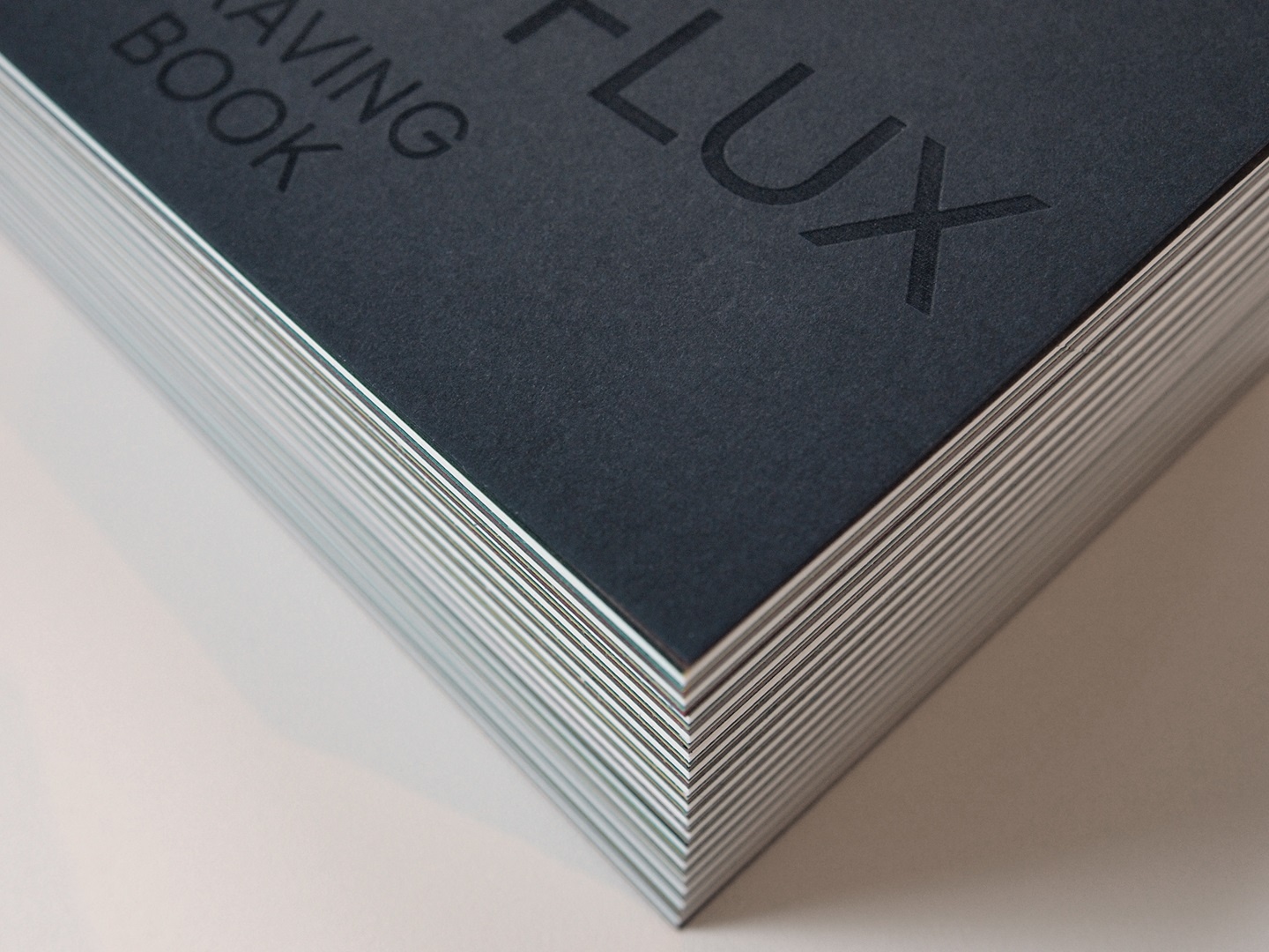 A FLUX brand book engraved with a laser engraver