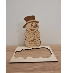 Houten kerstkaart sneeuwman