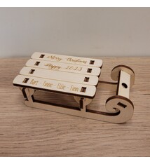 Houten kerstkaart arreslee