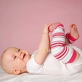Hoppediz Beenwarmers Organic Wit/roze gestreept
