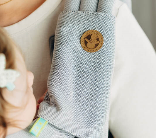 Welke teethingpads of droolpads passen op mijn draagzak? 