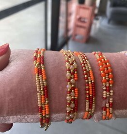Biba Biba: armband pareltjes op elastiek oranje