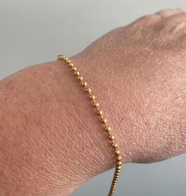 geen merk Armbandje - goudkleurig - bolletjes