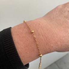geen merk Armbandje - goudkleurig - drie bolletjes