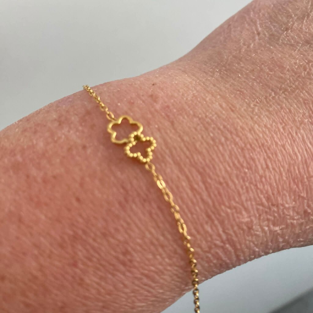Wauw Wauw: armbandje goud in stainless steel - bloemetjes open