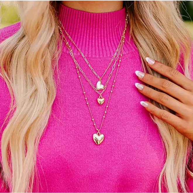 Ga voor een speelse, gelaagde look met deze roestvrijstalen ketting in drie lagen.