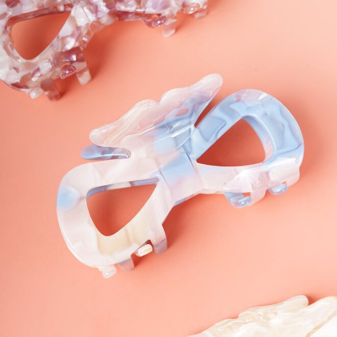 Clip in marmerlook met blauwe en roze tinten.