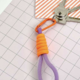 Sleutelhanger neon lila/oranje