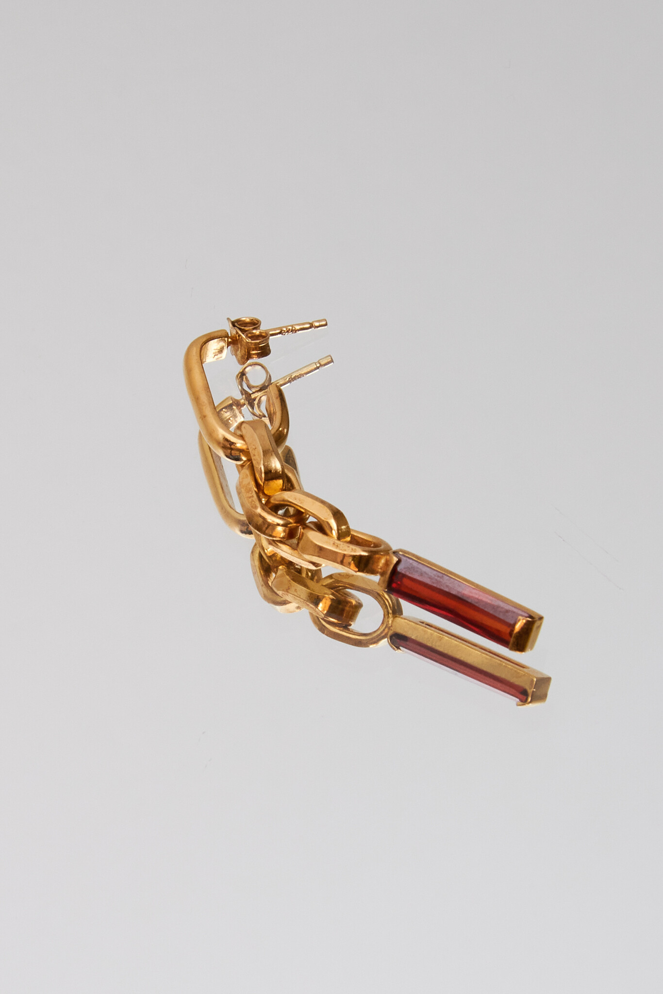 Festive garnet statement earring