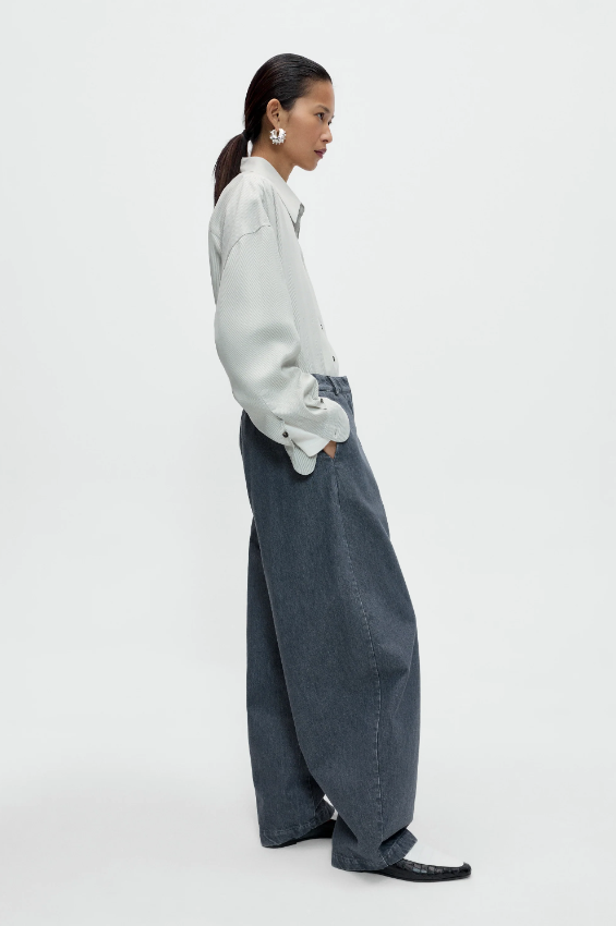 Cordera - Washed denim curved pants