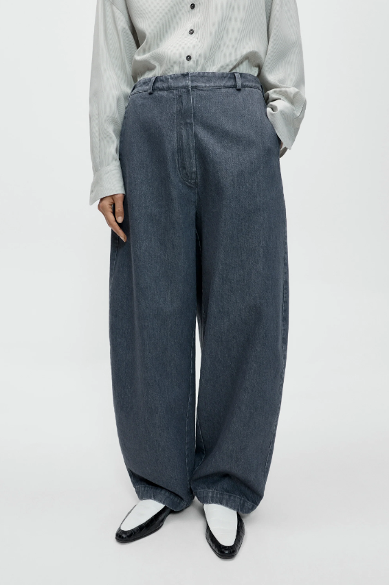 Cordera - Washed denim curved pants