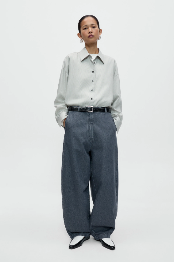 Cordera - Washed denim curved pants