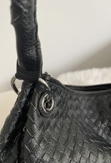 Woven bag in artifical leather