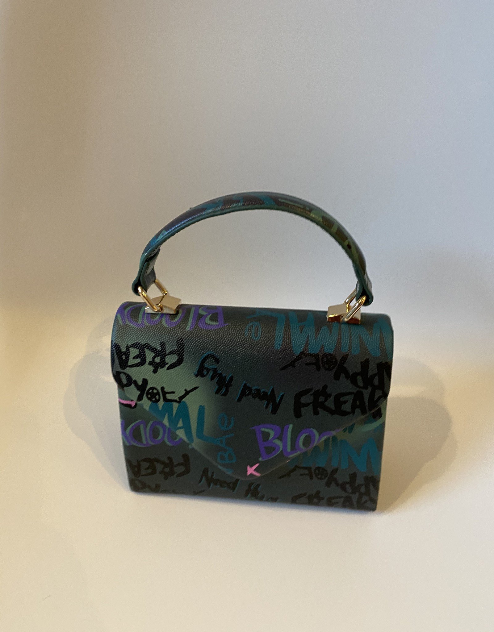 Calfskin handbag with graffiti print