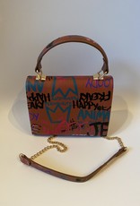 Fantasy bag with graffiti and long shoulderbelt and handle