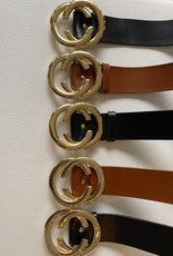 Leather belt with golden buckle with detail