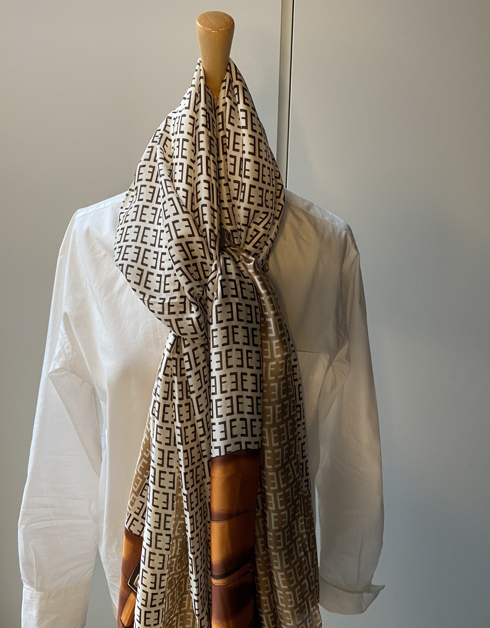 Long scarf F logo, Beige/brown and orange colors.
