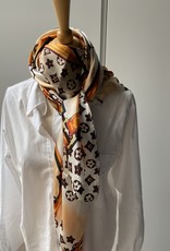 Scarf with brown/beige and orange colors.